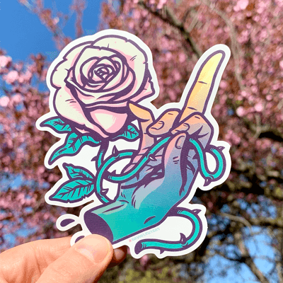 Sticker of rose and torns, with a hand giving the fuck you finger.